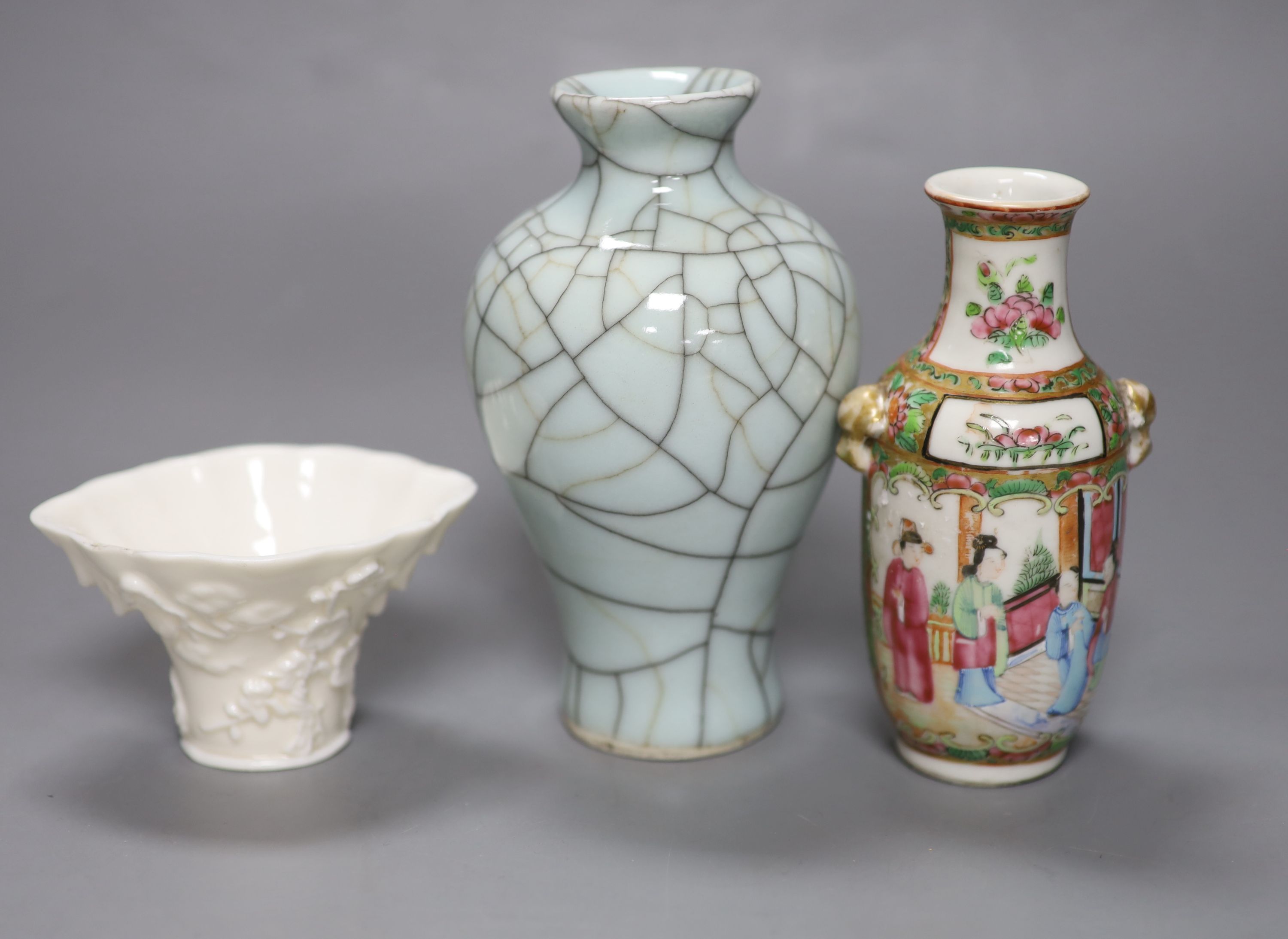 A Chinese white glazed libation cup, a similar famille rose vase and a crackle glaze vase, tallest 16cm